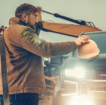 Construction worker at truck