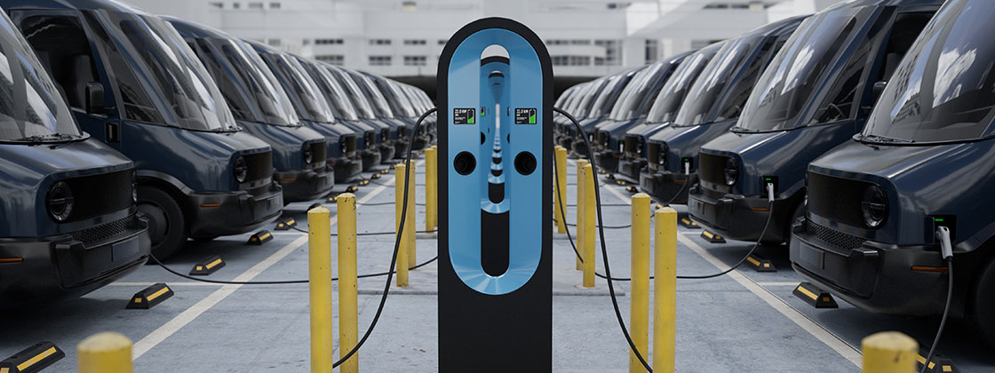 Man at electric charging station