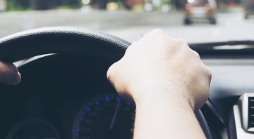 Hands on steering wheel while driving