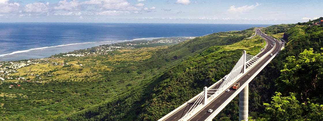 White bridge next to ocean