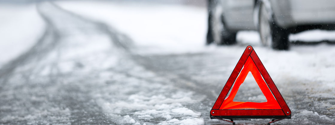 Icy road hazard sign