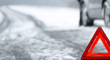 Winter road hazard with orange and red hazard size