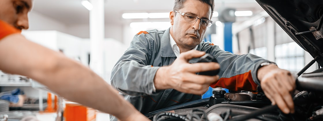 Mechanic working on vehicle