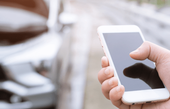 vehicle on side of road driver on phone